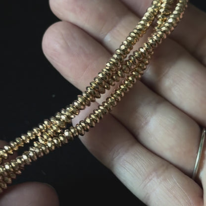 14k plated hematte faceted rondelle beads up close video